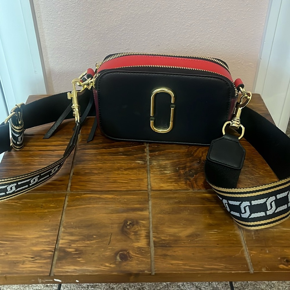 URBU women’s broadband mini bag never used